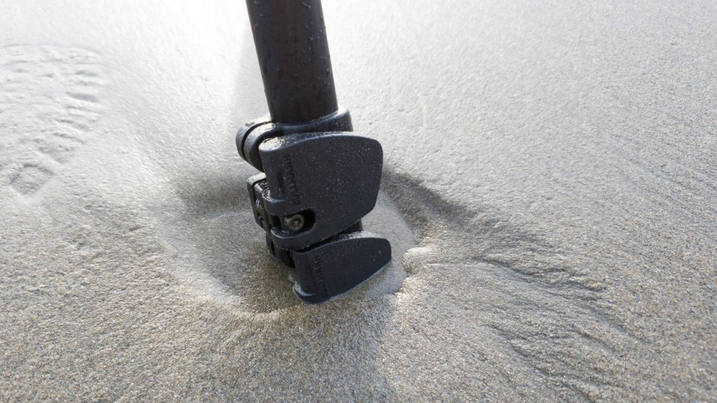 Stativbein im Sand